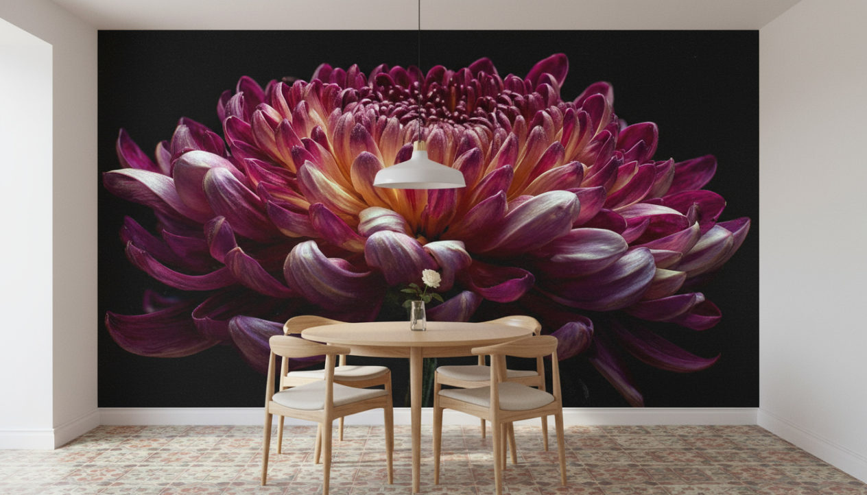 Photorealistic airy dining room. Map the provided reference image as WALLPAPER on the accent wall behind the dining table; treat it as a single mural, do not tile. Center and cover the wall edge-to-edge without distortion, keeping proper vanishing lines. Round light-wood table with 4–6 minimalist chairs, a simple pendant light, one small vase as the only centerpiece. Vintage encaustic floor tiles in muted earthy tones that complement the deep floral mural; white ceiling, clean baseboards. Matte wallpaper finish with gentle paper fiber texture; subtle ambient occlusion where wall meets floor and furniture. Bright daylight with soft shadows, balanced white. Camera at eye level with a slight three-quarter angle so the wallpapered wall remains the focal point. No text, numbers, logos, or watermarks.