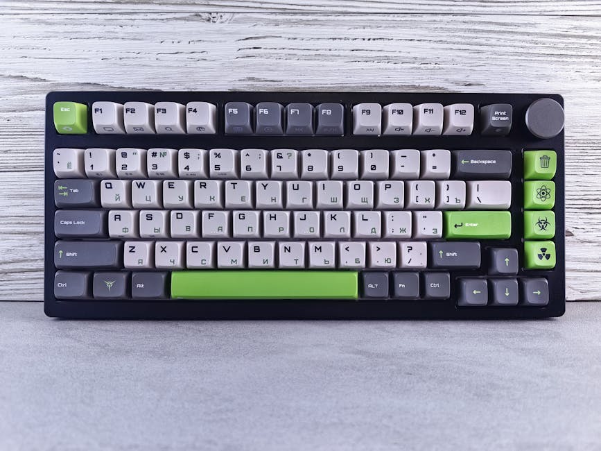 Custom mechanical keyboard with Cyrillic and English keycaps on a wooden surface.