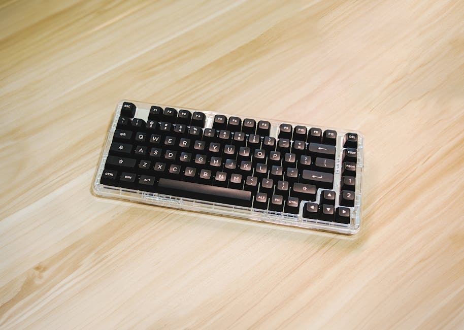 A modern mechanical keyboard placed on a clean wooden desk, highlighting minimalist design.