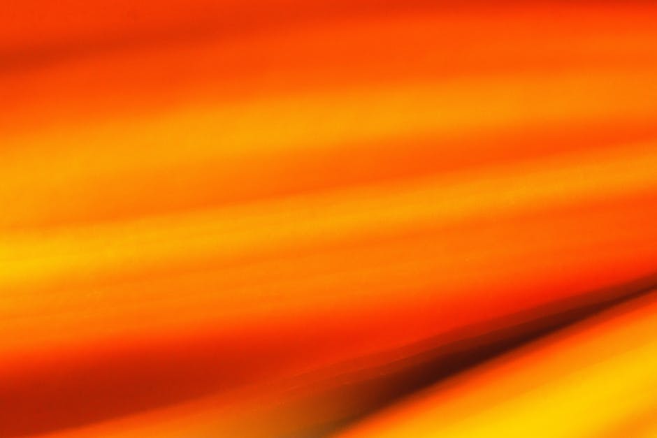 A dynamic blend of orange hues creates an engaging abstract visual experience.